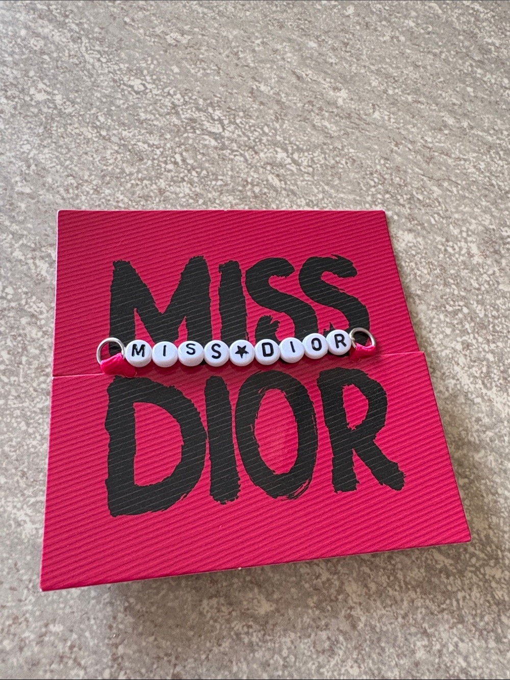 Dior MISS DIOR Pink Cord Beaded Bracelet with White Lettering